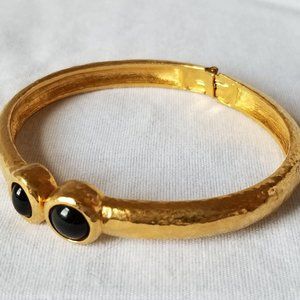 Vintage MONET goldtone bangle bracelet with onyx